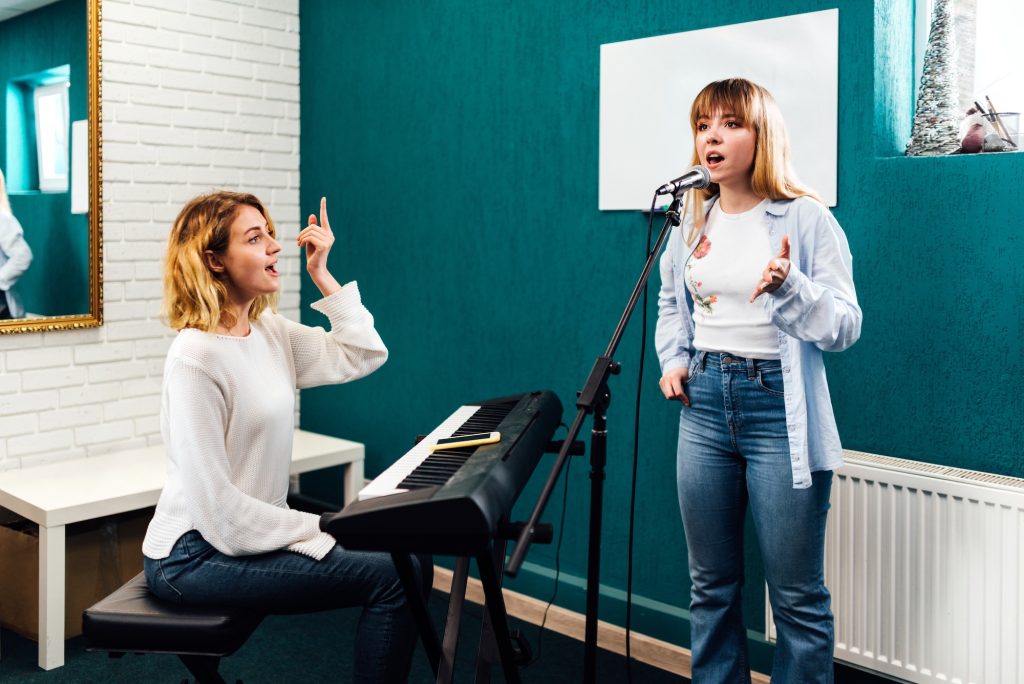 vocal lesson in singing class at music academy